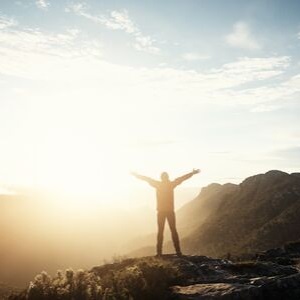 Person on top of mountain